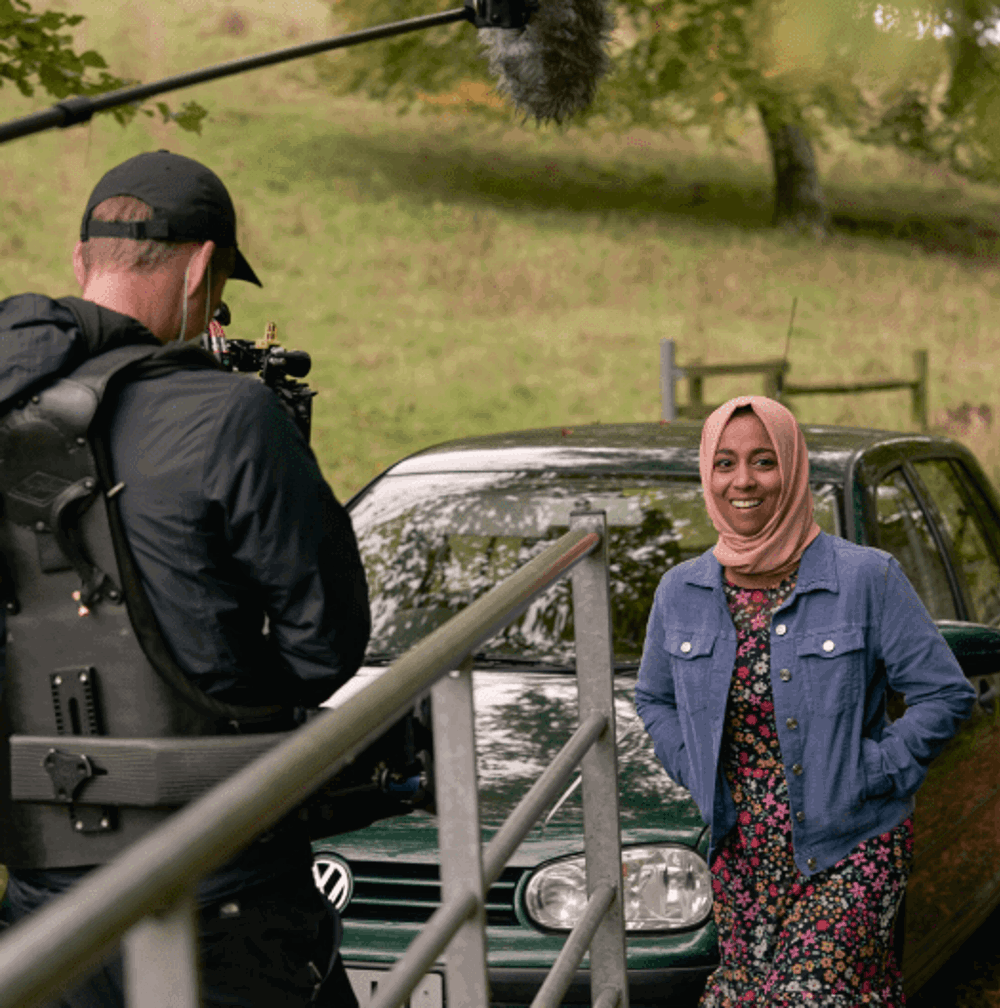 Sisters Elli and Izzi from Channel 4's Gogglebox are mouth-open, shocked at  something they are watching television.